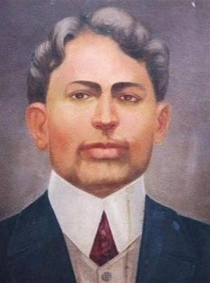 Painted colour portrait of Madan Lal Dhingra in a dark jacket and high white collar, head and shoulders.